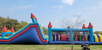Large inflatable obstacle course for birthday parties and family events
