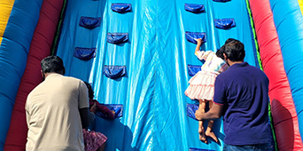 Colorful inflatable slide setup for Houston celebrations